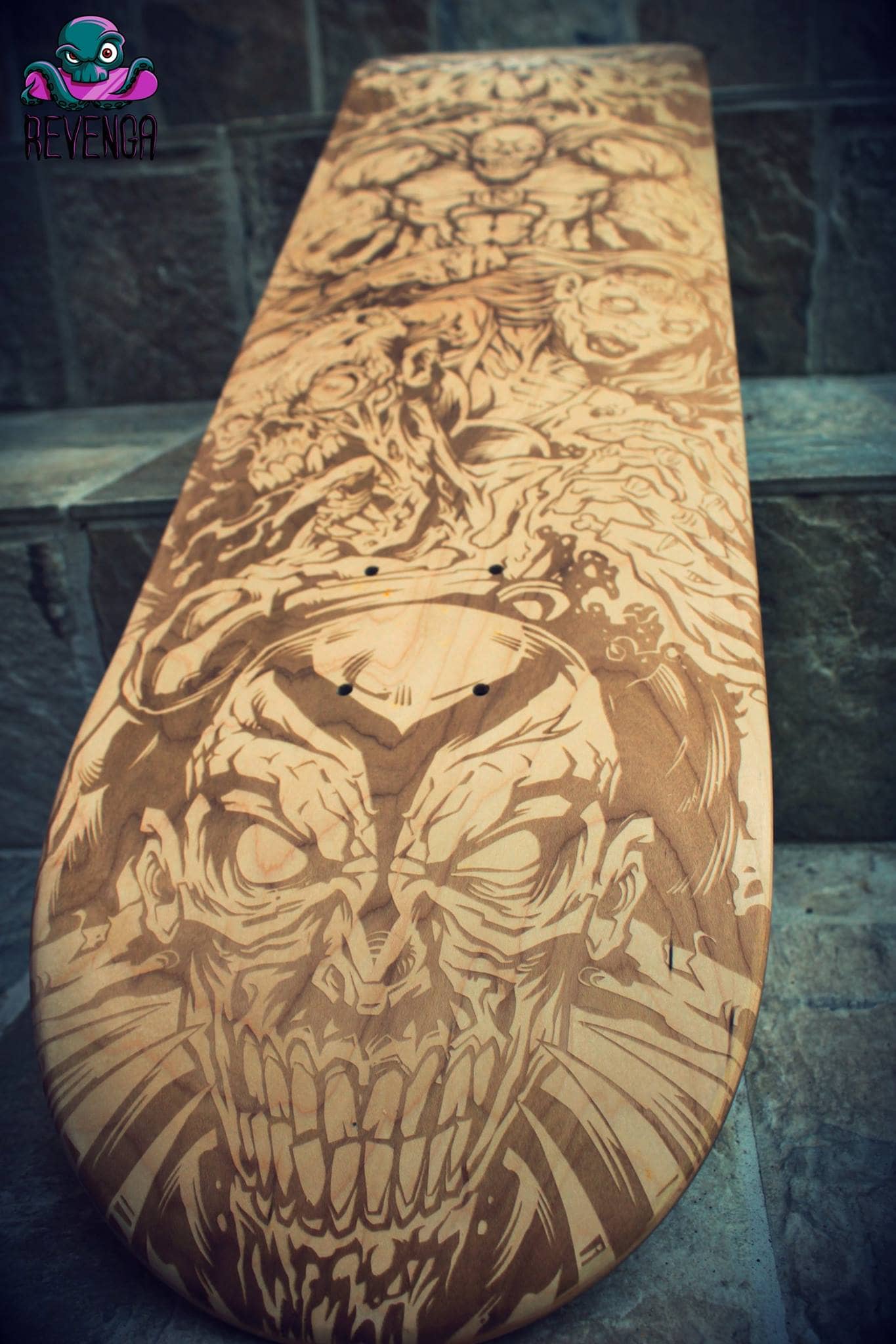 Laser-engraved skateboard design of a team of zombie superheroes