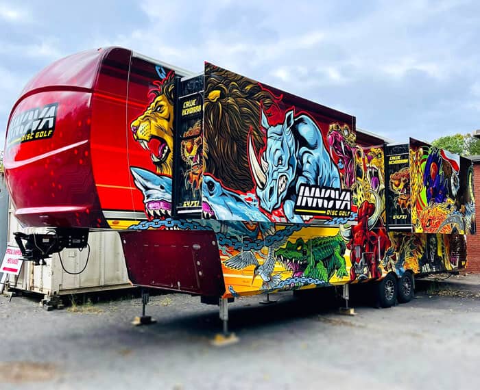An RV wrap designed for disc golf client, Callie McMorran, and features an assortment of Innova Mascot animals. 