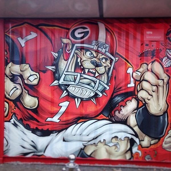 Here's a shot of my Georgia Bulldog illustration being wrapped on the Chick-Fil-A restaurant on the Georgia-Florida state line for their nationally televised commercial - so lucky to be a part of this! #georgiabulldogs #georgiafootball #mascotdesign #chickfila