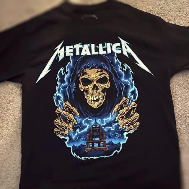 A design that I created for Merch Traffic for Metallica featuring a grim reaper skeleton hovering over an electric chair with blue lightning bolts.