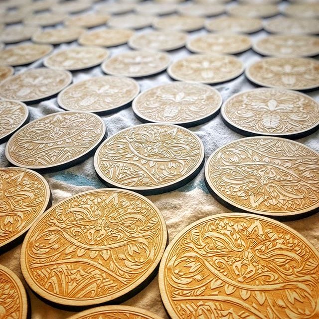 Man, thanks for all the positive feedback on these tiki coasters I designed (in my shop now)! I had my artwork laser-engraved by @graffitipete and they did an amazing job. I took them to an art festival this weekend and they did very well. Look at that texture - don't you just want to roll around on them?#tikiart #tikibar #beachart #tikitotem #surfart #tikiartist #beach #laserengraved #coasters