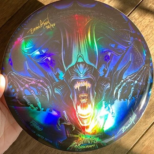 Here's a shot of my monthly Foil Disc Golf Disc with my Alien Queen artwork. Thanks for all the support on these!  Less than 10 of these left. Limited edition of 40. Signed and numbered, let me know if you want one!https://flylanddesigns.com/custom-illustrated-disc#alien #alienqueen #discgolf #frisbeegolf #discraftdiscs #teamdiscraft #discraft #disc