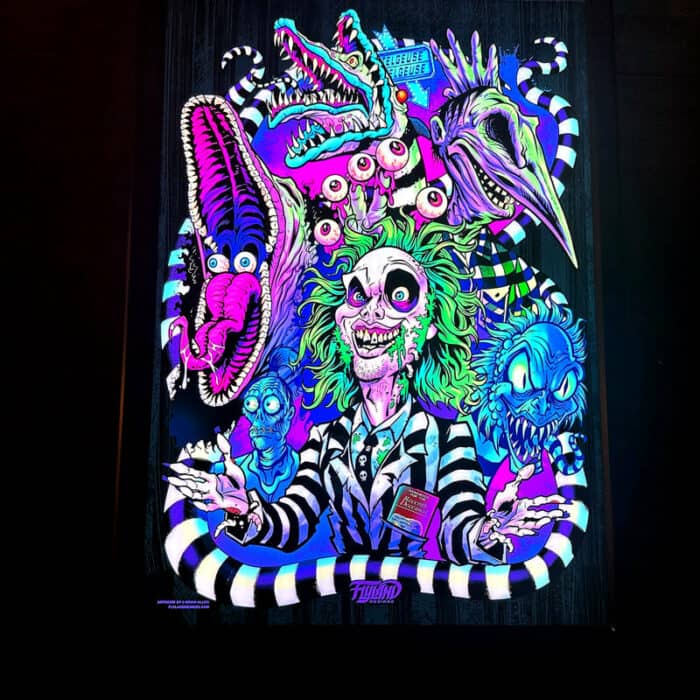 My Custom Illustration of  Beetlejuice and all the favorite characters from the movie are  light up as a tanslite when put in an LED Voodoo Frame.