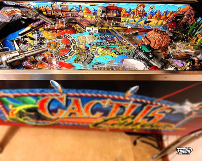 Cactus Canyon Side Blades illustrated by Brian Allen. These side blades are illustrated to look like and old western town with gun fighters and saloon women.