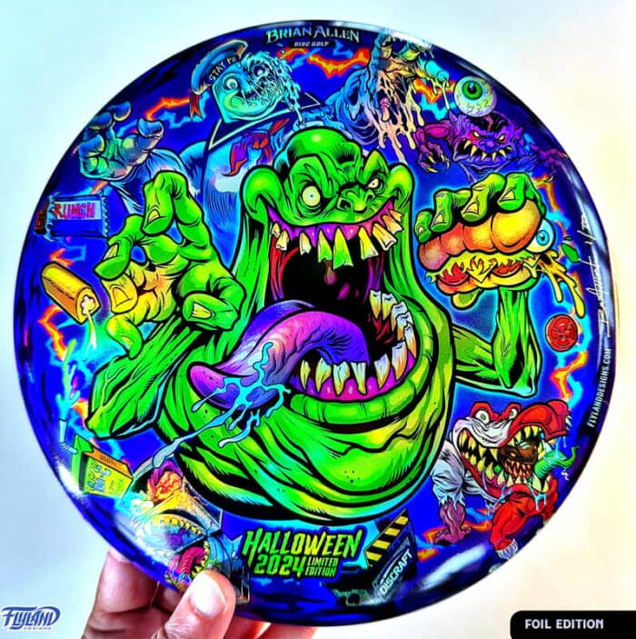 Tribute illustration of Slimer, StayPuft Marshmallow Man, and other ghosts from the Ghostbusters cartoon printed on a Disc Golf Disc