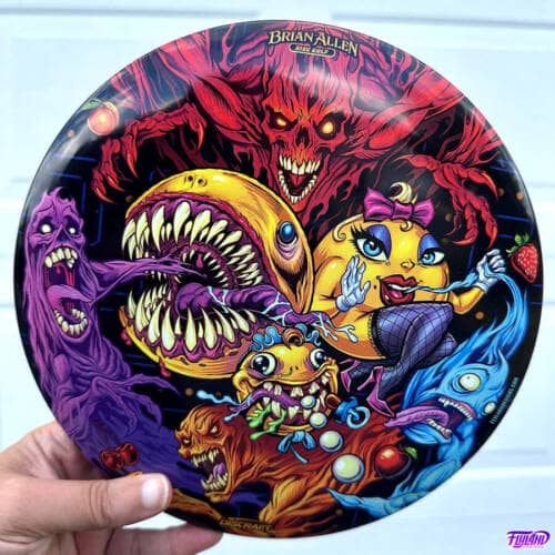 Colorful illustration parody of Pac-Man, Ms. Pac-Man, and Baby Pac-Man eating the ghosts from the retro arcade game drawn by Brian Allen and printed on a Discraft Buzzz Disc