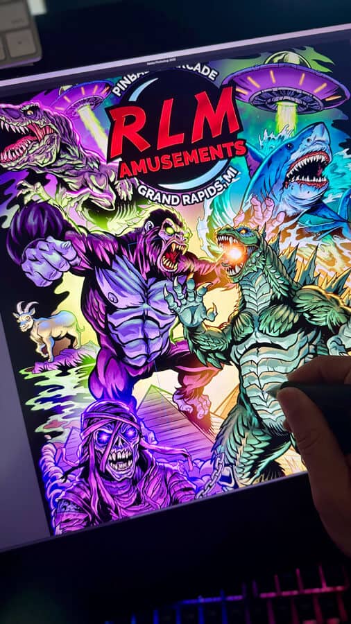 T-Shirt Design for RLM Amusements pinball and arcade business featuring a drawing of Godzilla fighting King Kong with the shark from Jaws, the mummy Eddie from Iron Maiden, the T-Rex from Jurrasic Park, and a UFO.