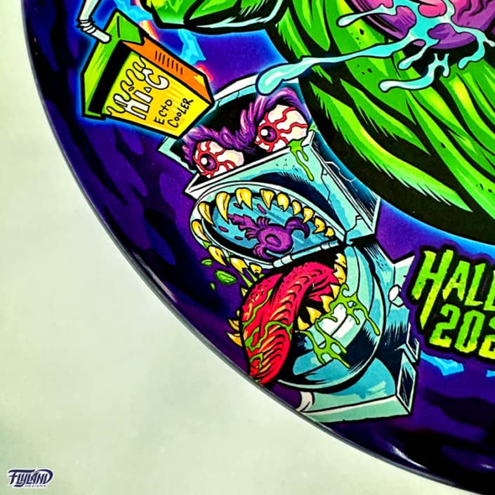 Tribute illustration of Slimer, StayPuft Marshmallow Man, and other ghosts from the Ghostbusters cartoon printed on a Disc Golf Disc