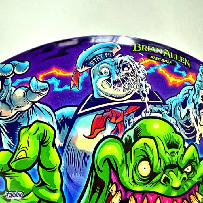 Tribute illustration of Slimer, StayPuft Marshmallow Man, and other ghosts from the Ghostbusters cartoon printed on a Disc Golf Disc