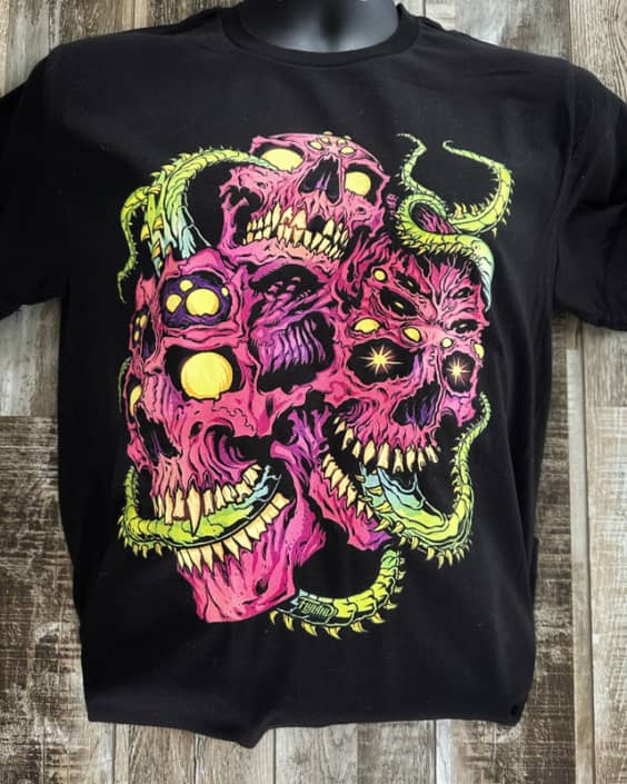 3 trippy looking pink skulls wit