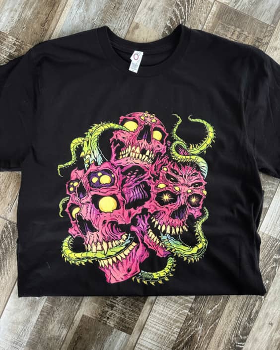 3 trippy looking pink skulls wit