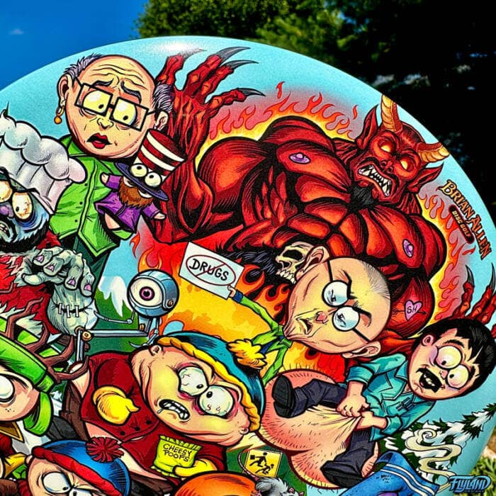 Drawing of the South Park characters in a darker style drawn by Brian Allen including Stan, Cartman, Kenny, Kyle, Chef, Satan, Terrance and Phillip, Randy, Mr. Garrison, Mr. Mackey, and more printed on a SuperColor Buzzz Disc Tribute