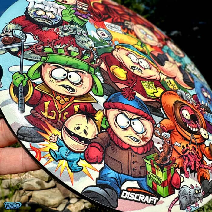 Drawing of the South Park characters in a darker style drawn by Brian Allen including Stan, Cartman, Kenny, Kyle, Chef, Satan, Terrance and Phillip, Randy, Mr. Garrison, Mr. Mackey, and more printed on a SuperColor Buzzz Disc Tribute