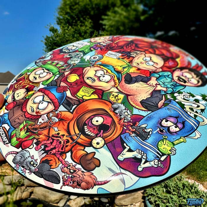 Drawing of the South Park characters in a darker style drawn by Brian Allen including Stan, Cartman, Kenny, Kyle, Chef, Satan, Terrance and Phillip, Randy, Mr. Garrison, Mr. Mackey, and more printed on a SuperColor Buzzz Disc Tribute