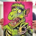 An illustration of a green Zombie Alf holding the skull of a cat