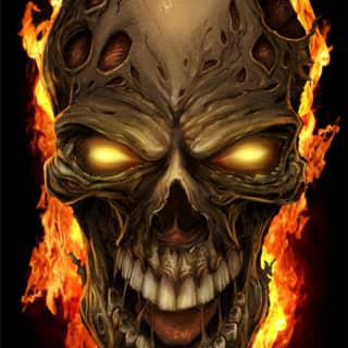 Zombie skull grinning on fire wi